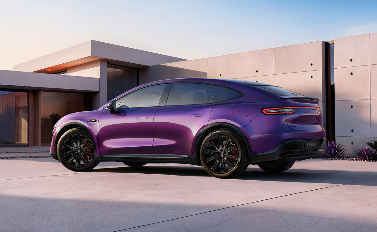 Rear view of the Luxeed R7 in Midnight Purple, showing its sport spoiler