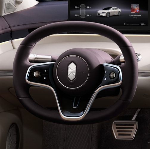 Showing the Luxeed New S7 olive-shaped steering wheel, more responsive to control, with the added Luxeed logo for a more refined and elegant look